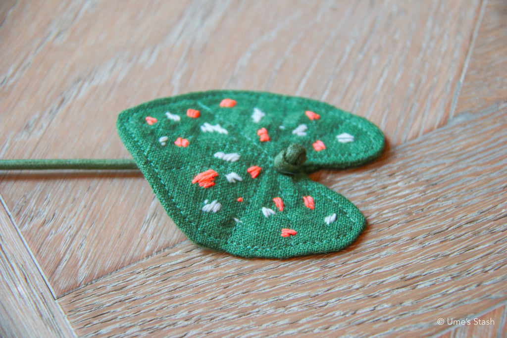 Caladium leaf teaser wand