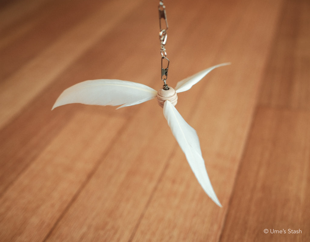 Hurricane feather wand attachment